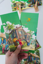 Load image into Gallery viewer, Loka Made brings to life the celebratory times of Hari Raya in the heart of Kampung through an illustration entitled 'Riang Ria Raya'. At its core, this beautiful place captures the essence of family togetherness, reflecting the cherished traditions and joyous times we share without loved ones during the festive season. 5 different designs in a set.
